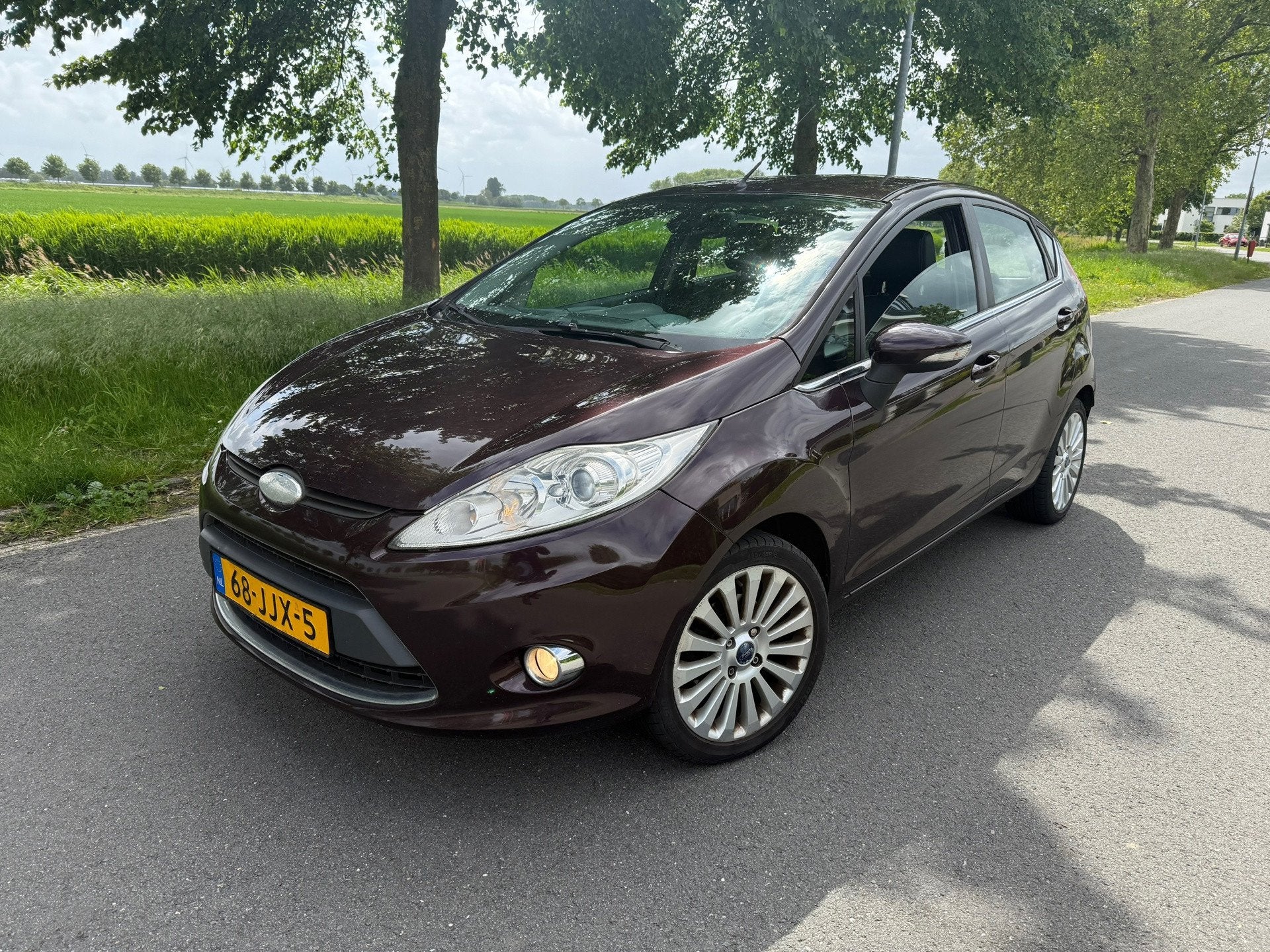 Ford Fiesta 1.6 Titanium CLIMA/CRUISE/NAVI/LEER, Auto's, Voorwielaandrijving, 1596 cc, Bedrijf, Handgeschakeld