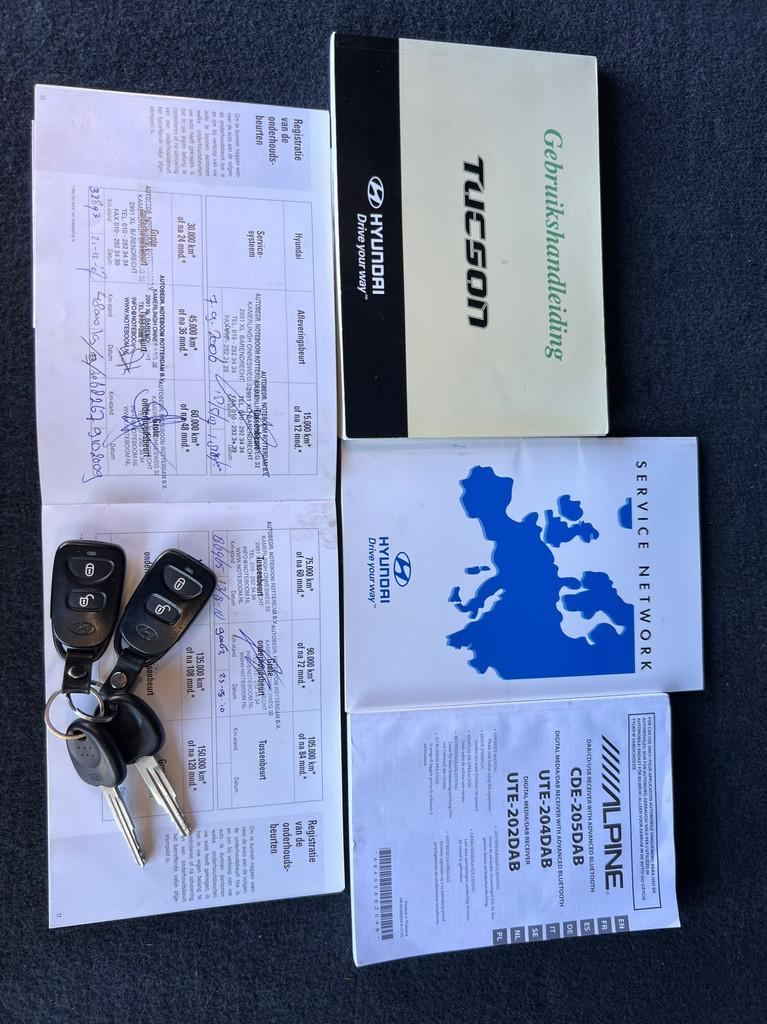 Hyundai Tucson 2.0i Style Premium CRUISE CONTROL/LEDEREN BEK, Auto's, Hyundai, Gebruikt, 4 cilinders, Handgeschakeld, Grijs