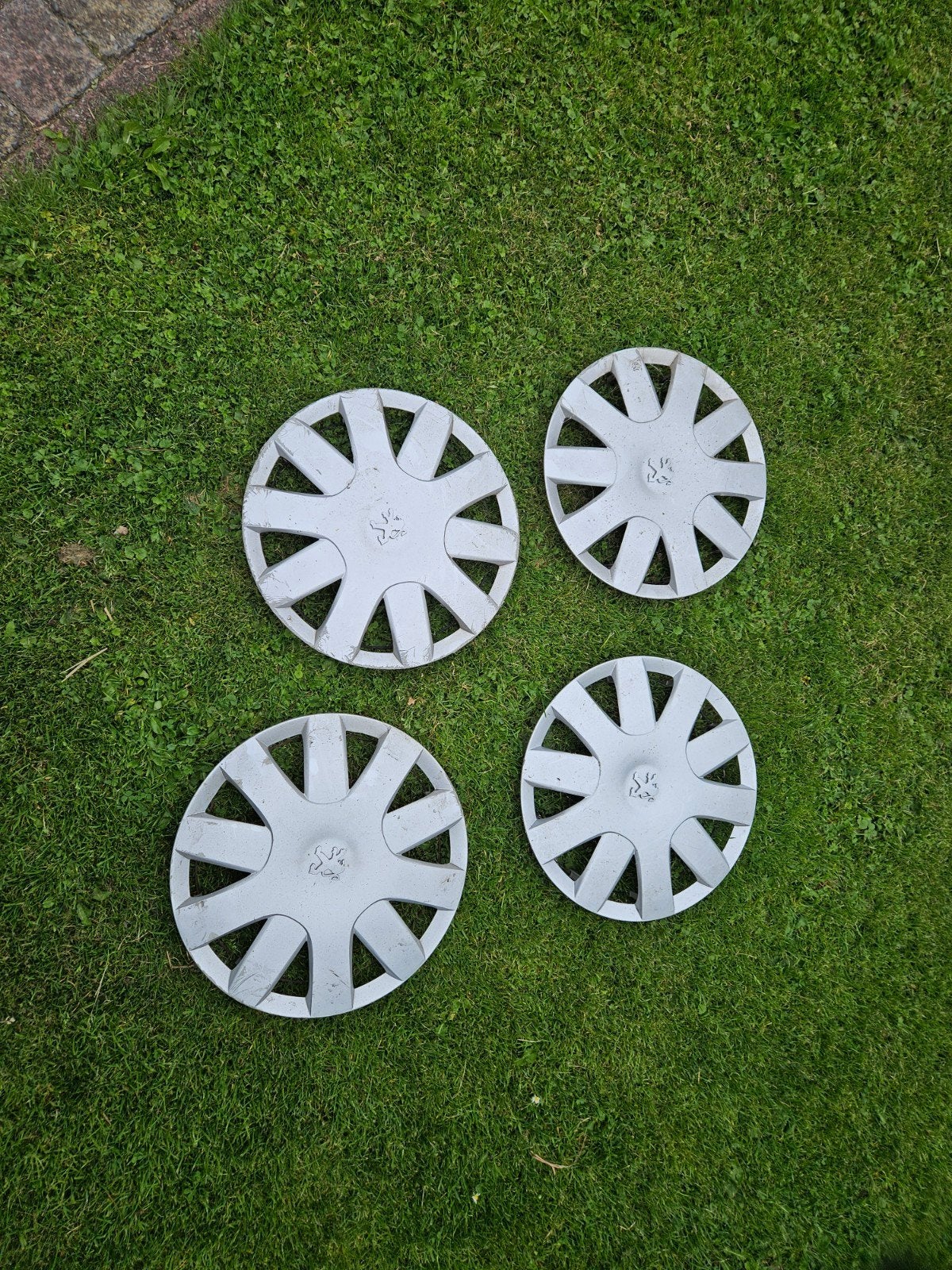 Peugeot wieldoppen set (4 stuks), Auto diversen, Wieldoppen, Gebruikt, Ophalen of Verzenden