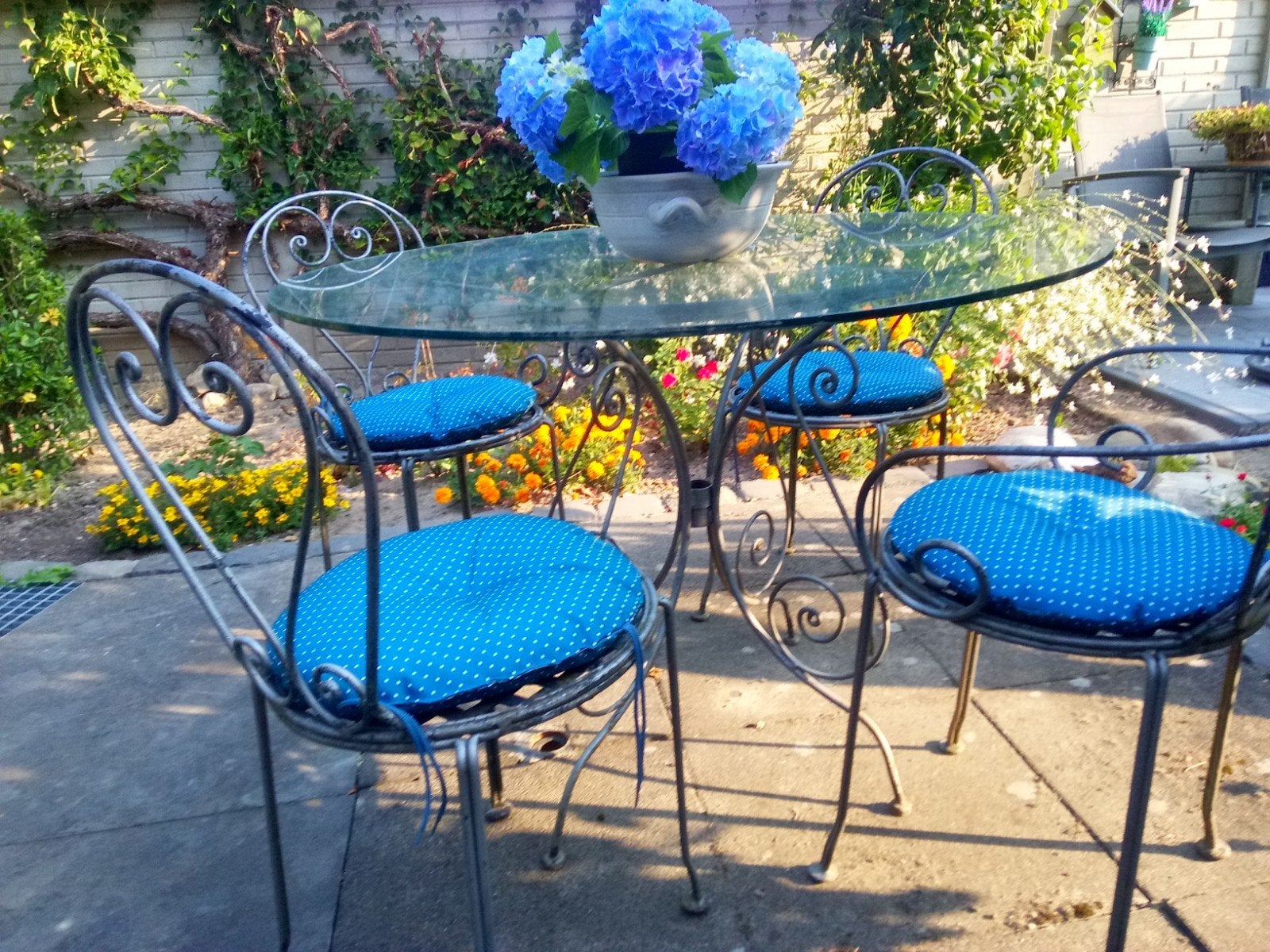 Smeedijzeren tuinset met glazen tafel en 4 stoelen, Ophalen, Gebruikt, Tuinset, Eettafel