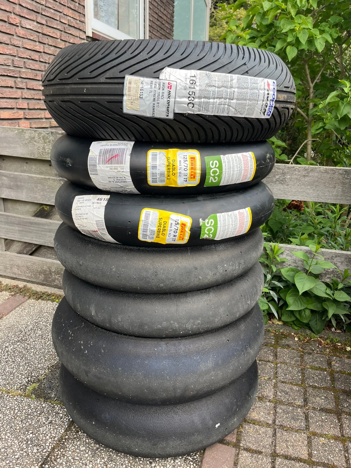 Nieuwe- en gebruikte slicks en regenband te koop., Ophalen of Verzenden