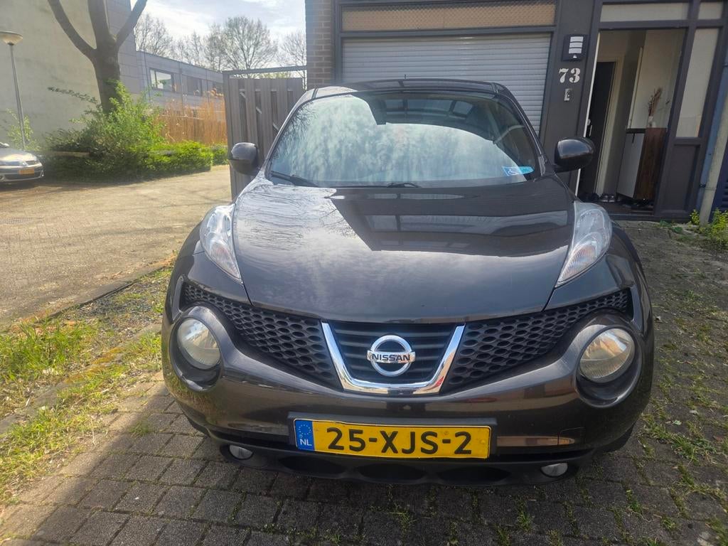 Nissan Juke 1.6 CVT 86KW 2012 Bruin, Auto's, Euro 5, Stof, 1250 kg, Bruin