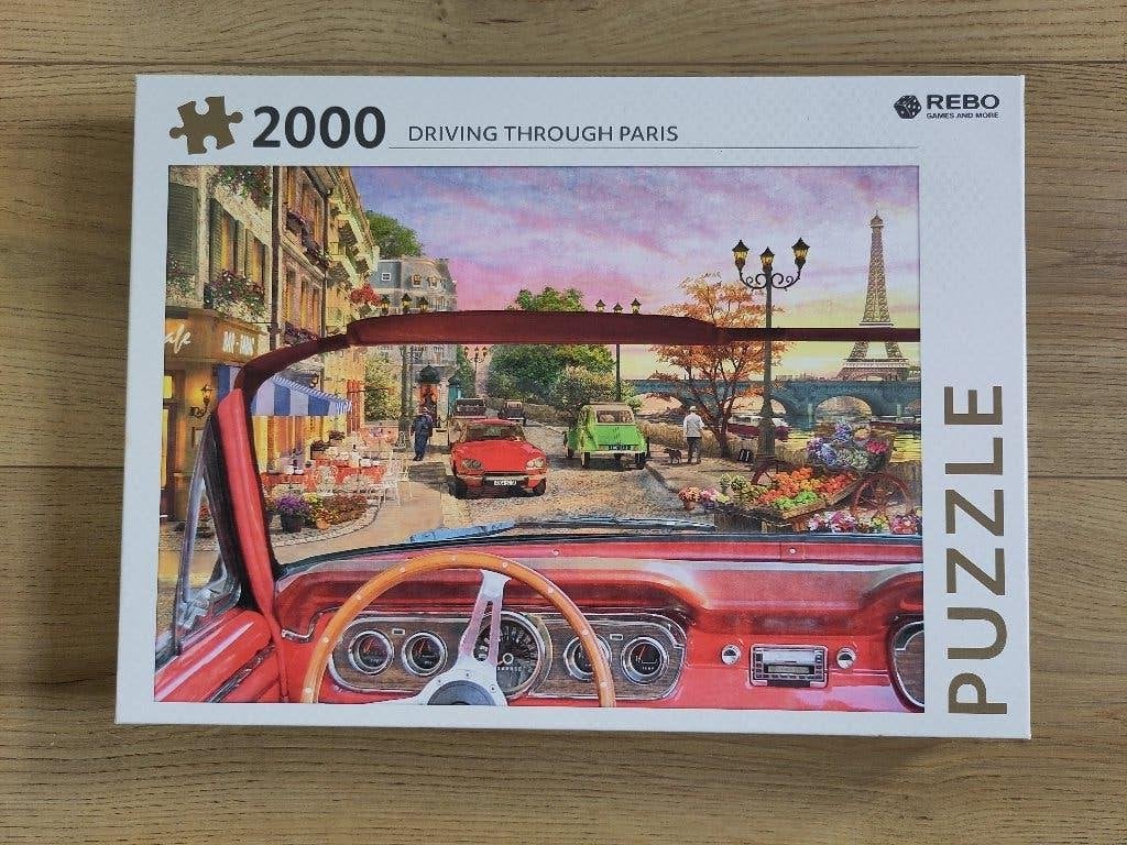 Puzzel 'Driving through Paris' 2000 stukjes, Ophalen, Meer dan 1500 stukjes, Zo goed als nieuw, Legpuzzel