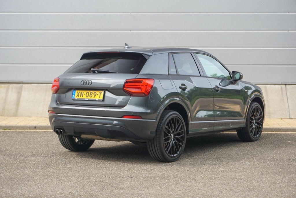 Audi Q2 2.0 TFSI 190pk S-tronic Quattro Sport Edition | Trek, Auto's, Audi, Automaat, Gebruikt, Leder en Stof, Vierwielaandrijving