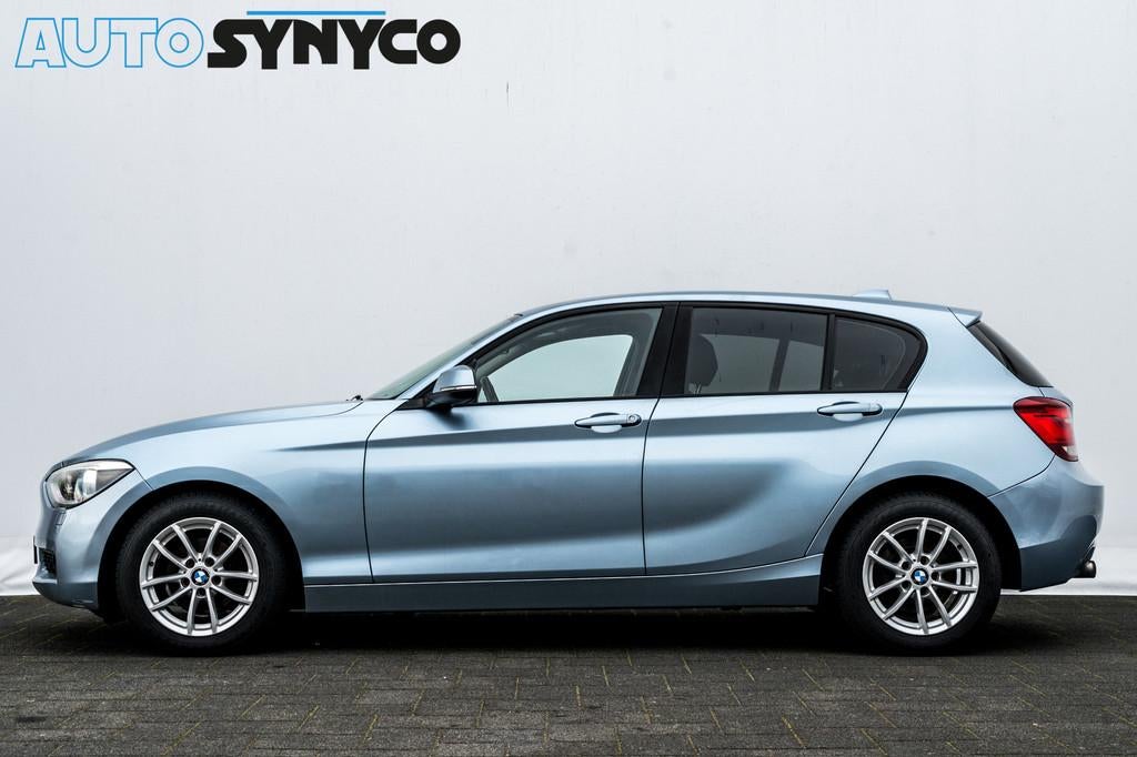 BMW 1-serie 116i Business | Airco | Xenon | Professional rad, Auto's, BMW, Euro 5, Gebruikt, 4 cilinders, Blauw