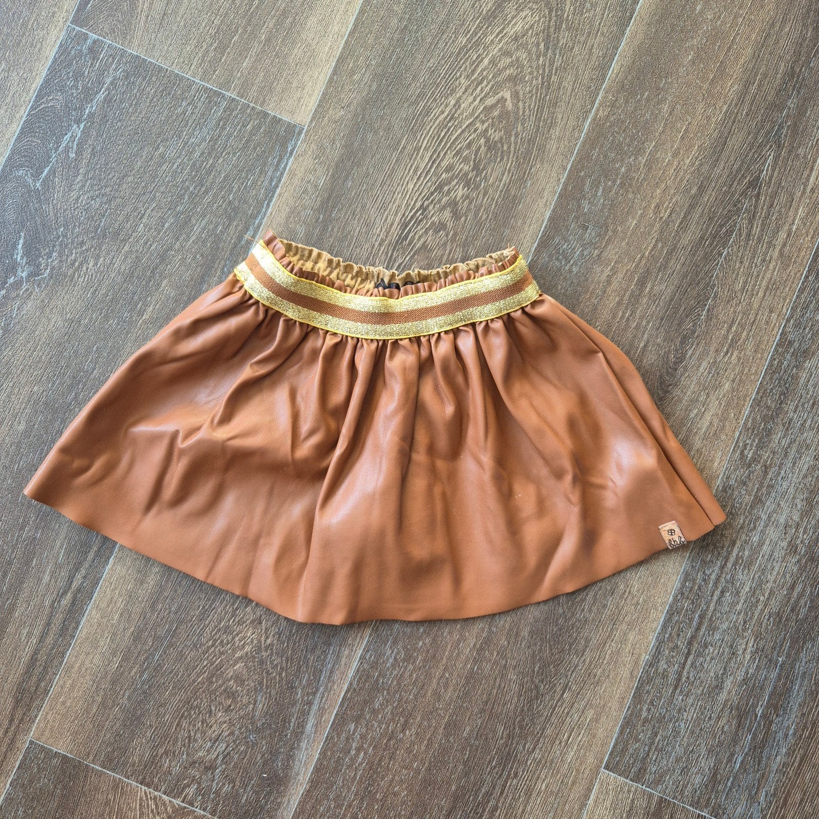 Bakkaboe leatherlook rokje maat 80 cognac met gouden bies, Gebruikt, Meisje, Jurkje of Rokje, Ophalen of Verzenden