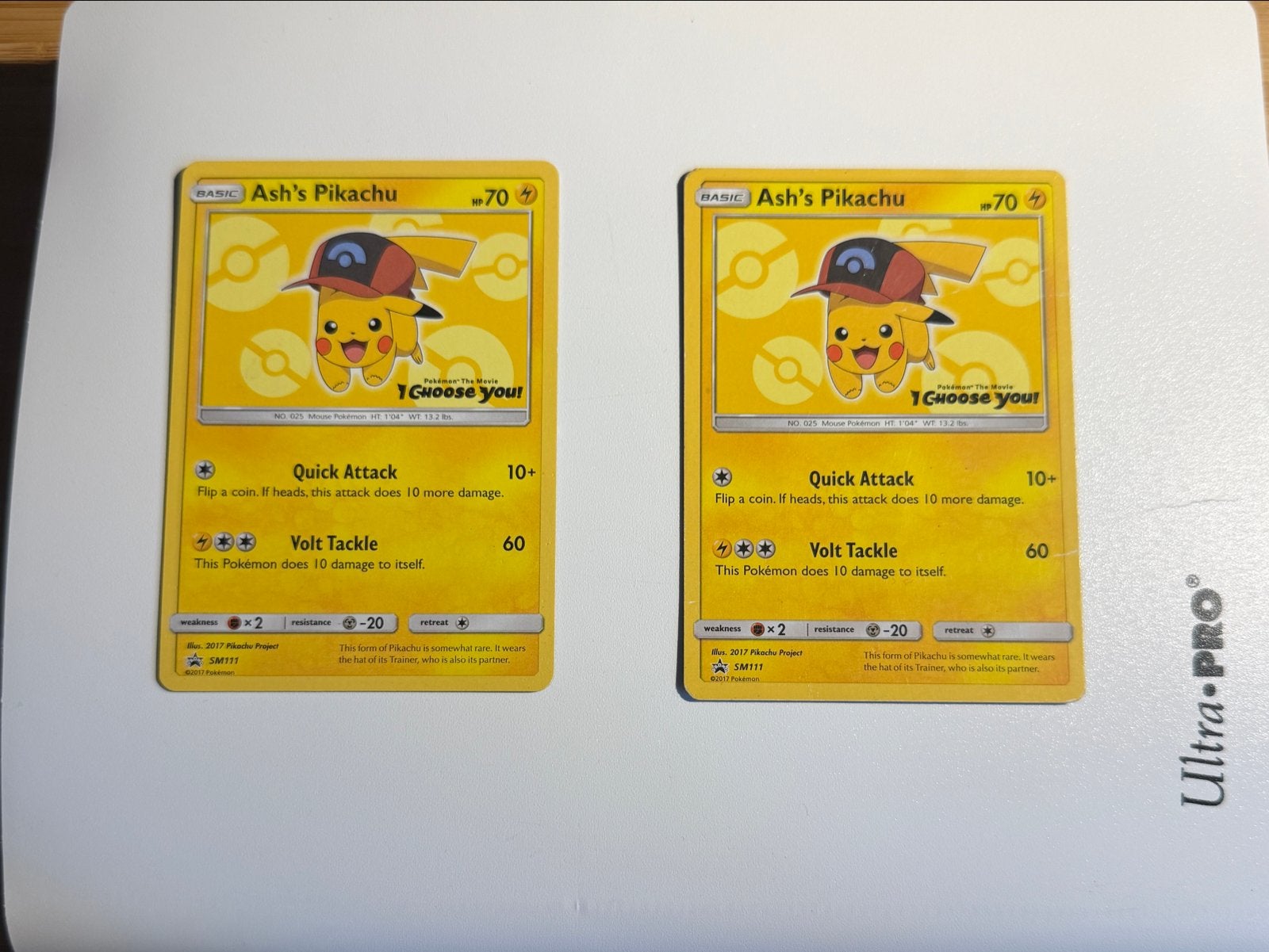 2x Ash's Pikachu SM111 Promo Kaart Pokémon, Ophalen, Zo goed als nieuw, Meerdere kaarten