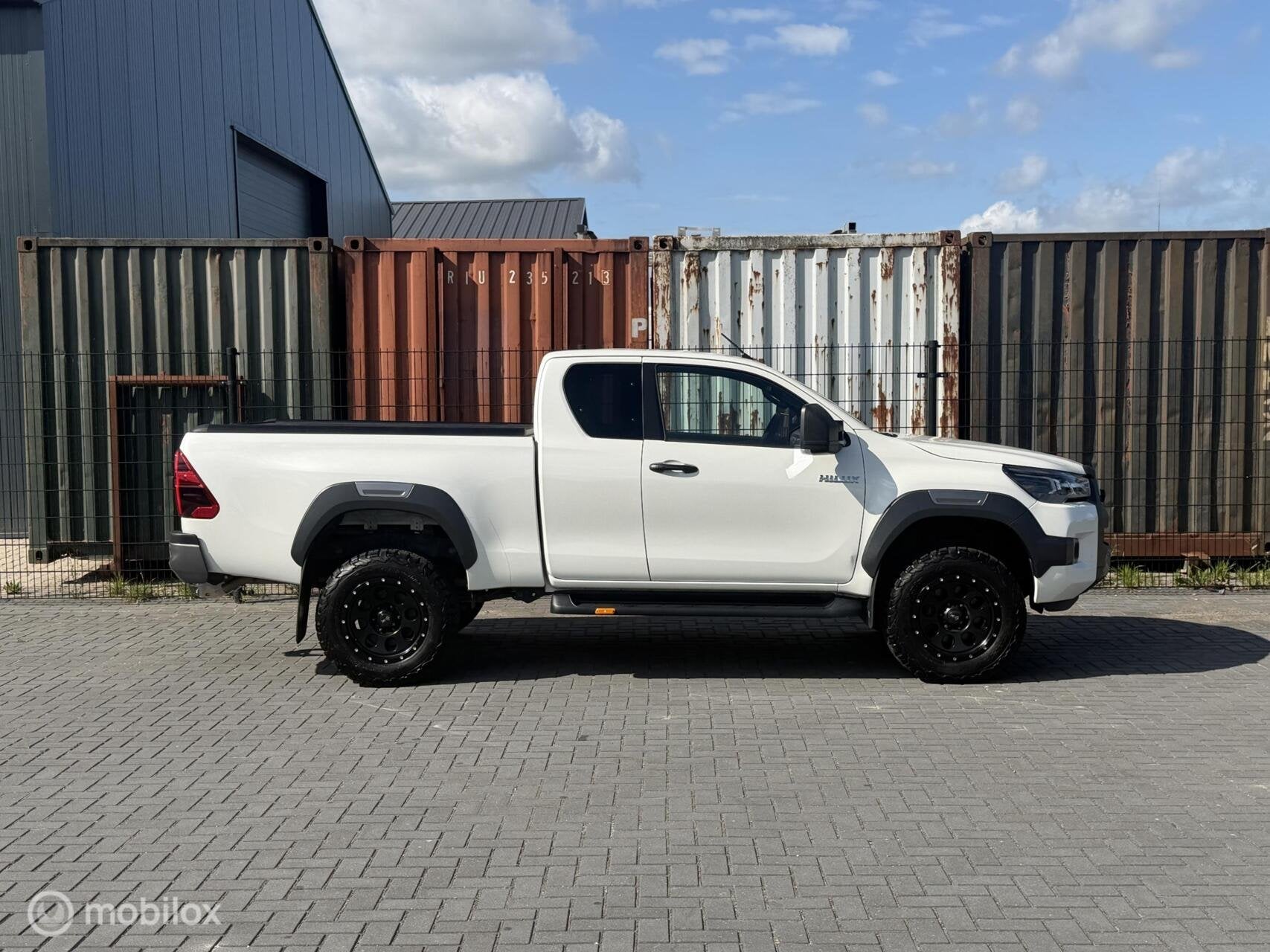 Toyota HiLux 2.8 D-4D Professional premium V&B Luchtvering, Auto's, Automaat, Stof, Gebruikt, 4 cilinders