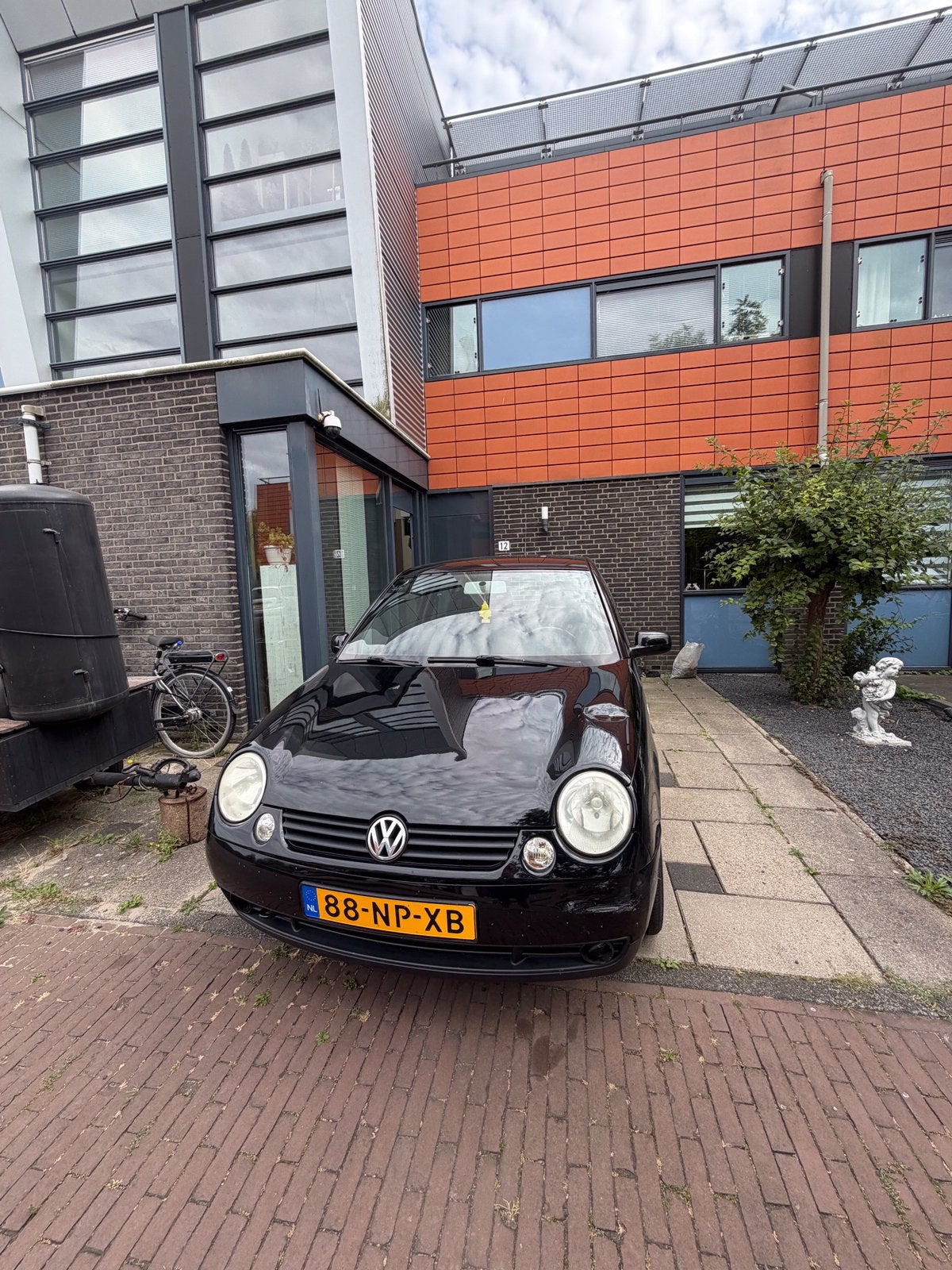 Volkswagen Lupo 1.4 44KW 2004 Zwart, Auto's, Volkswagen, Voorwielaandrijving, 450 kg, 31 €/maand, 4 cilinders