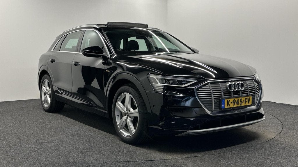 Audi e-tron 55 quattro Business edition Plus 95 kWh LEER PAN, Auto's, Audi, Automaat, 131 €/maand, Zwart, 95 kWh
