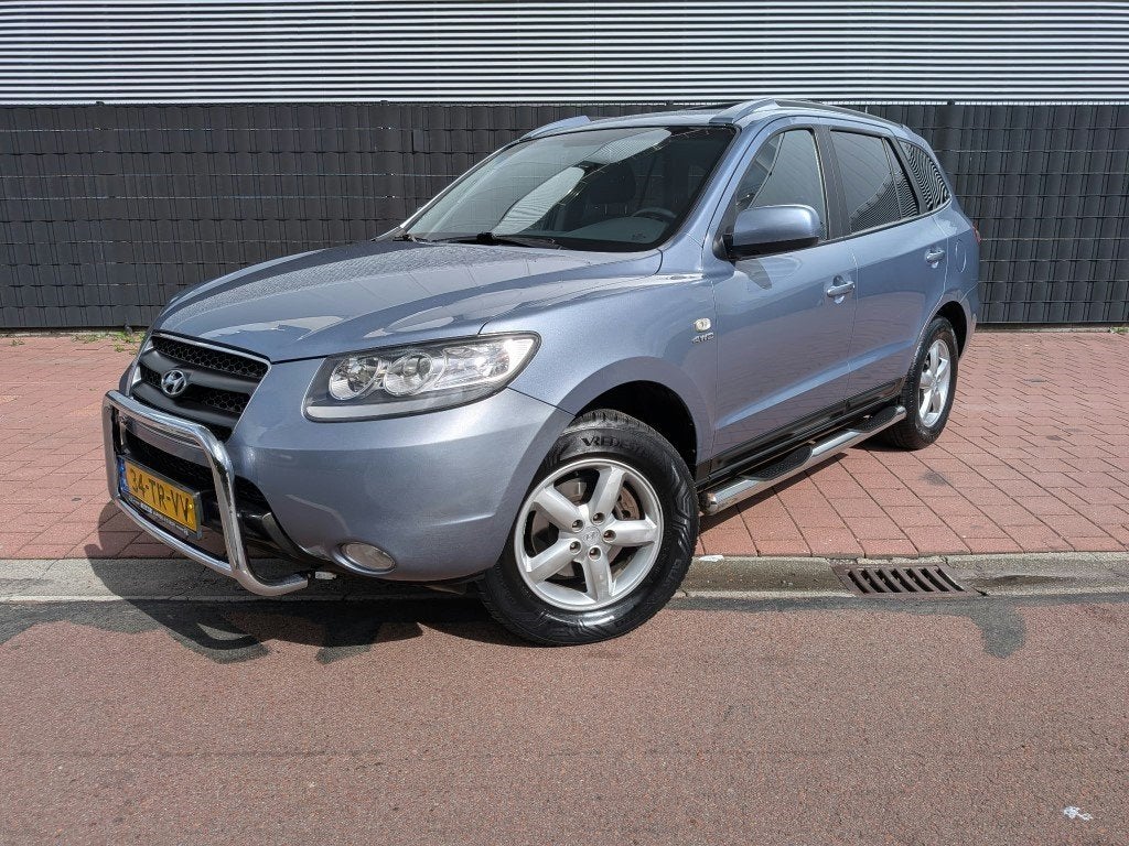 Hyundai Santa Fe 2.7i V6 4WD Dynamic NAP Bijtellingvriendeli, Auto's, Automaat, Gebruikt, 2000 kg, Blauw