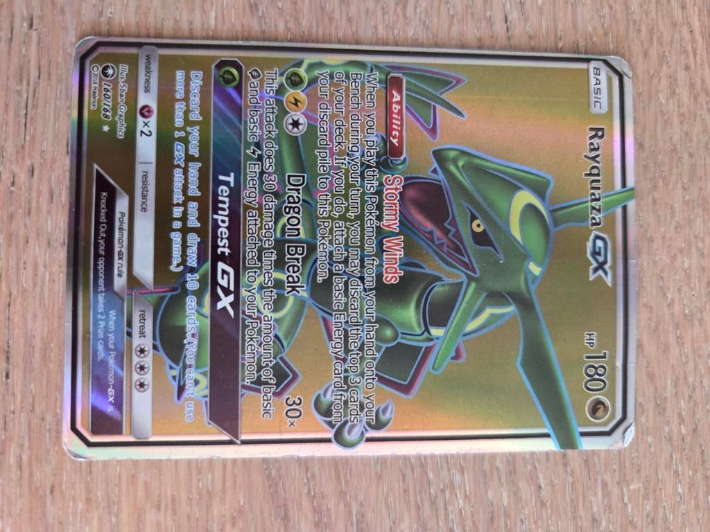 Pokémon Rayquaza GX. De hoekjes zijn iets beschadigd., Ophalen of Verzenden