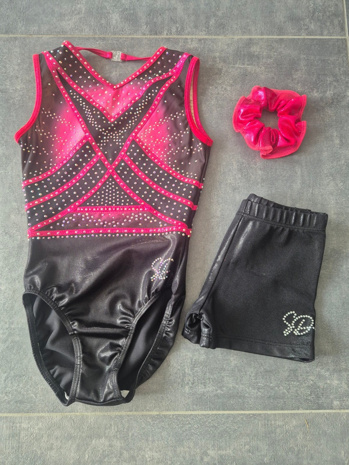 Turnpakje Sparkle & Dream
Supermooi zwart/roze tur, Zwart, Ophalen of Verzenden, Zo goed als nieuw, Turnpak(je)