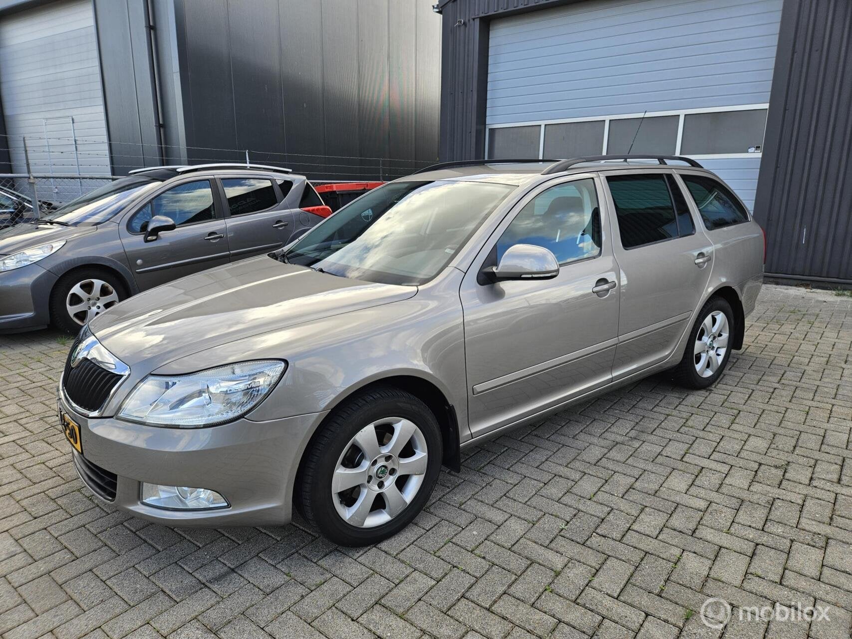 Skoda Octavia Combi 1.4 TSI Ambition AIRCO/CRUISE/NAVI/APK 0, Auto's, Voorwielaandrijving, Euro 5, Gebruikt, 4 cilinders