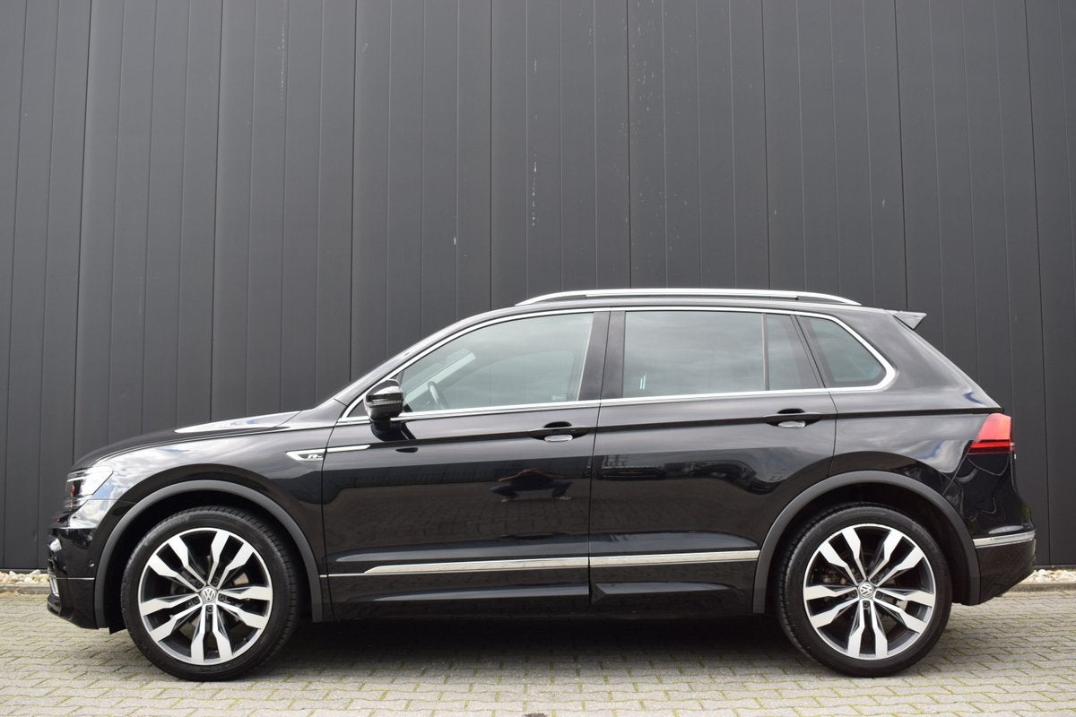 Volkswagen Tiguan 1.4 TSI Automaat Highline R-Line Virtual |, 4 cilinders, Zwart, Verwarmde buitenspiegels, SUV of Terreinwagen