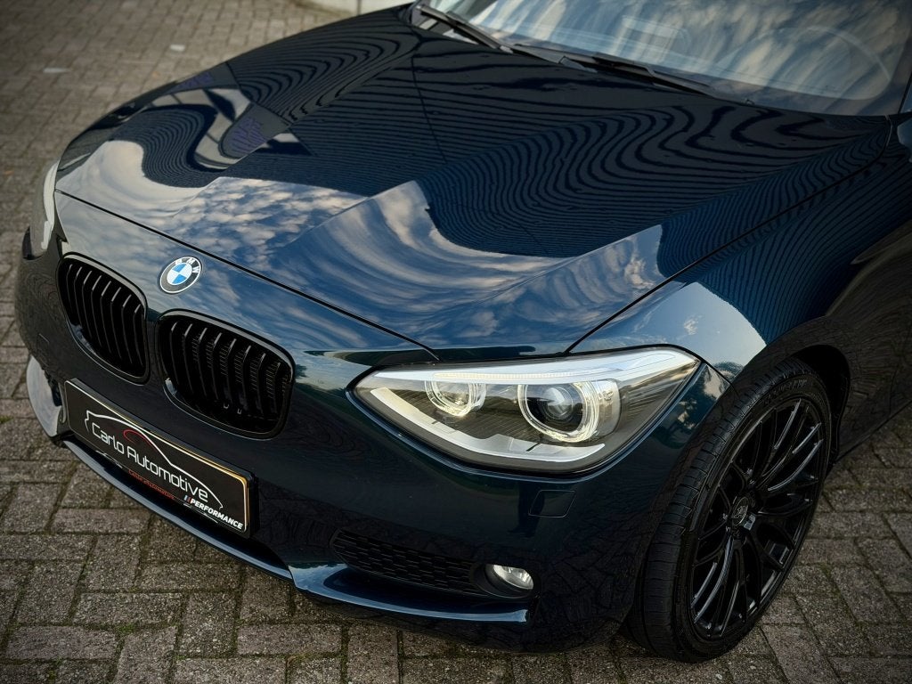 Bmw 1-serie 116i Executive AUT|CLIMA|XENON|NAVI|PDC, Dealer onderhouden, Gebruikt, 4 cilinders, Blauw