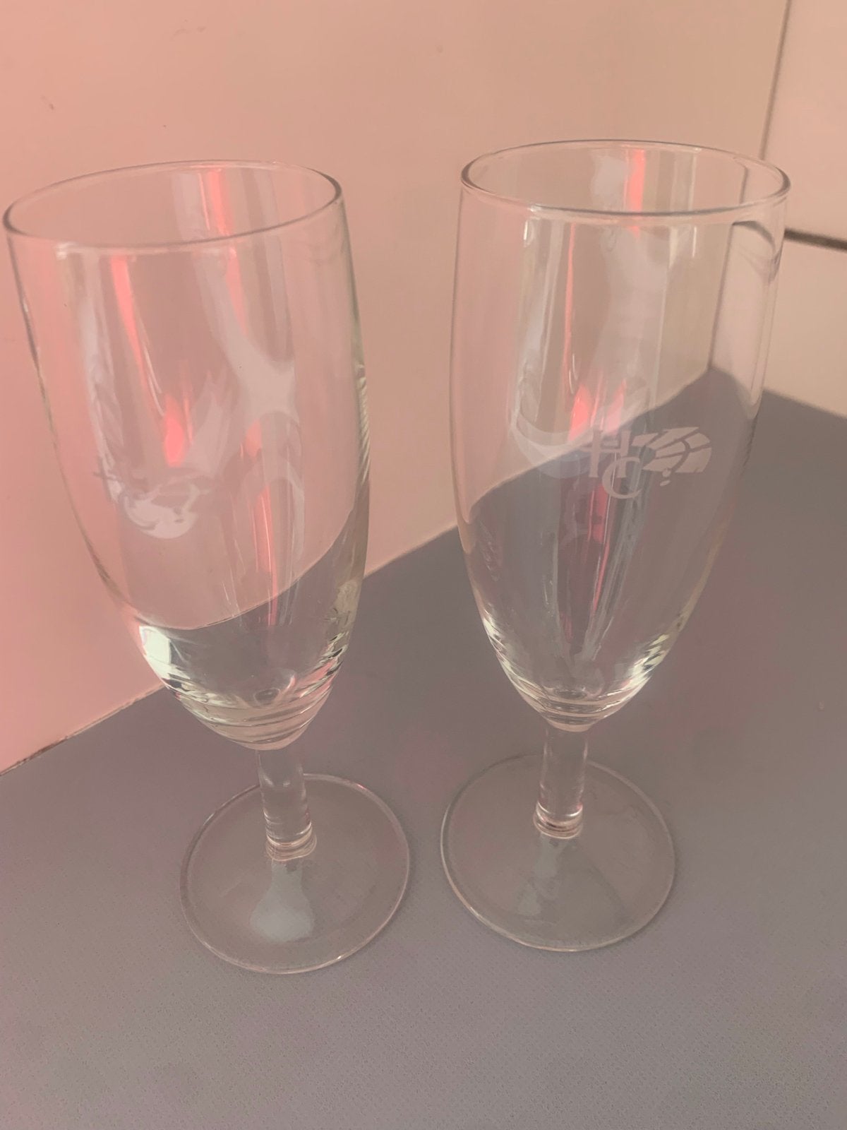 Set van 2 champagneglazen met logo Holland Casino, Ophalen of Verzenden