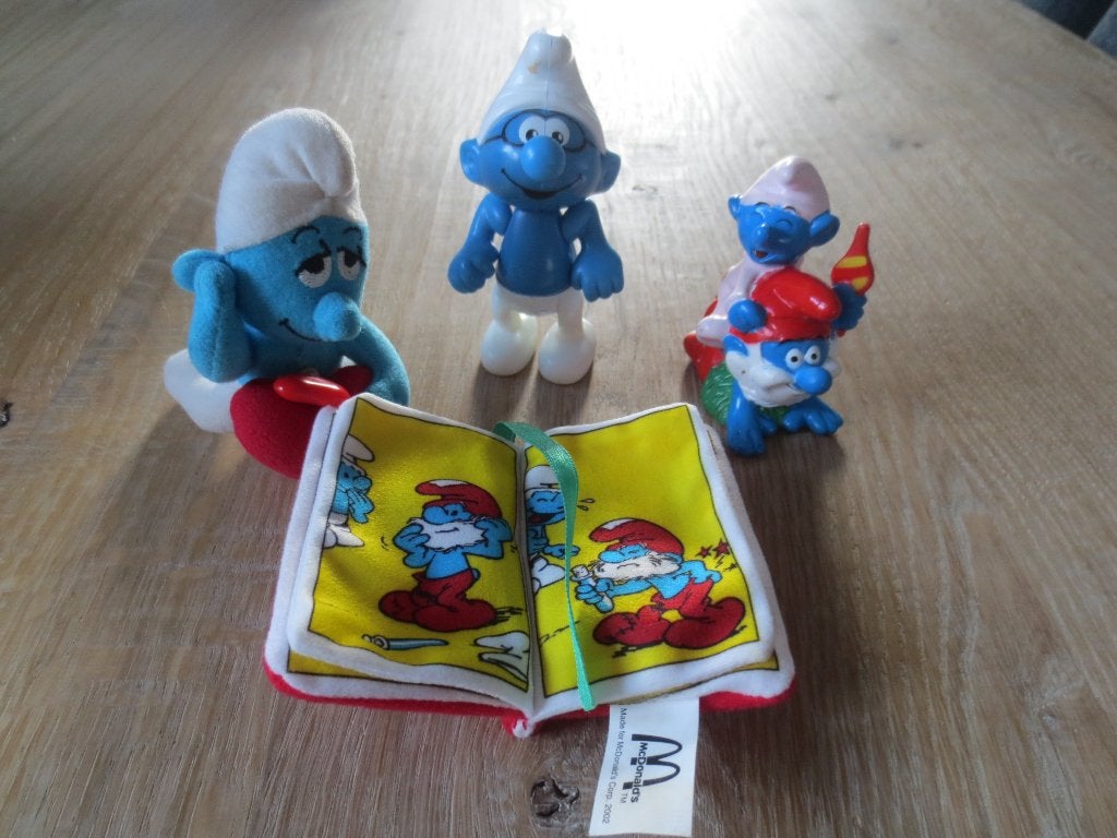 Smurfen: Verschillende Smurfen - beweegbare Smurf + boekje, Ophalen of Verzenden, Zo goed als nieuw, Verschillende Smurfen, Poppetje, Figuurtje of Knuffel