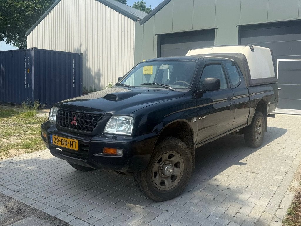 Mitsubishi L 200 2.5 TDi Club Cab 4x4, Auto's, Mitsubishi, 2700 kg, Gebruikt, 4 cilinders, Origineel Nederlands