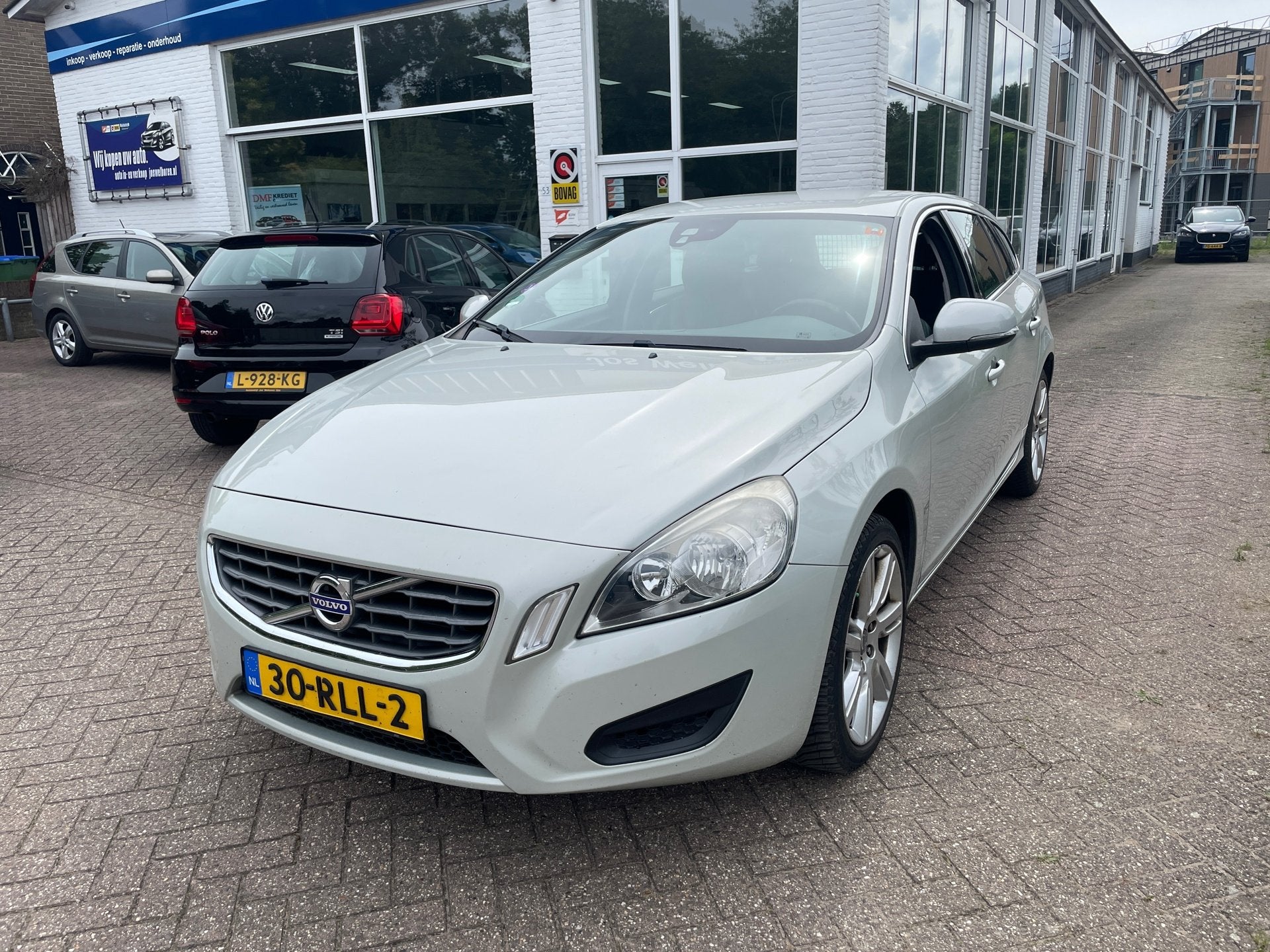 Volvo V60 1.6 T4 Momentum, Voorwielaandrijving, 15 km/l, Gebruikt, Leder en Stof