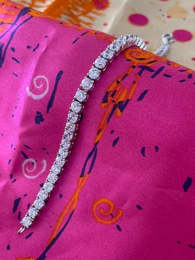 Zilveren tennisarmband met zirkonias, Ophalen of Verzenden, Gebruikt, Zilver, Met kristal