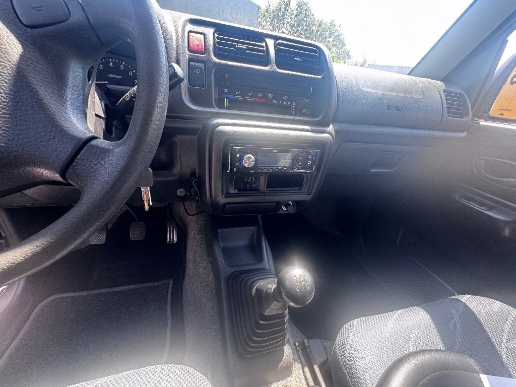 Suzuki Jimny 1.3 JX 4WD 2004 Beige, Auto's, 13 km/l, Stof, 40 €/maand, 4 cilinders