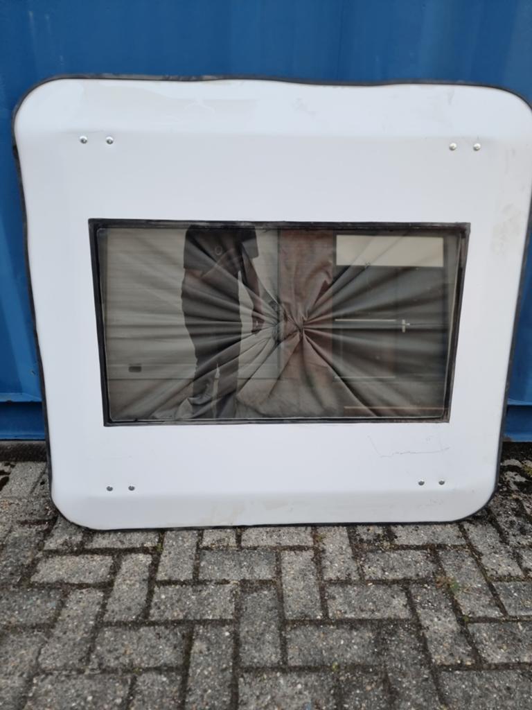 Nieuw camperdak met raam, Ophalen