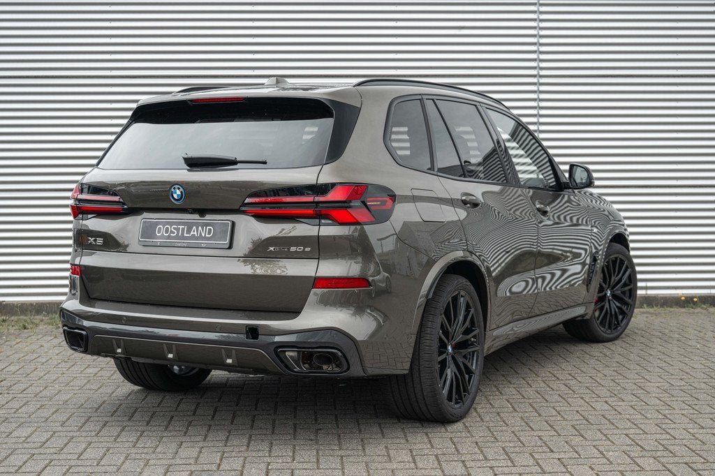 BMW X5 xDrive50e M Sport Automaat / Panoramadak Sky Lounge /, Automaat, 2395 kg, Zwart, Leder