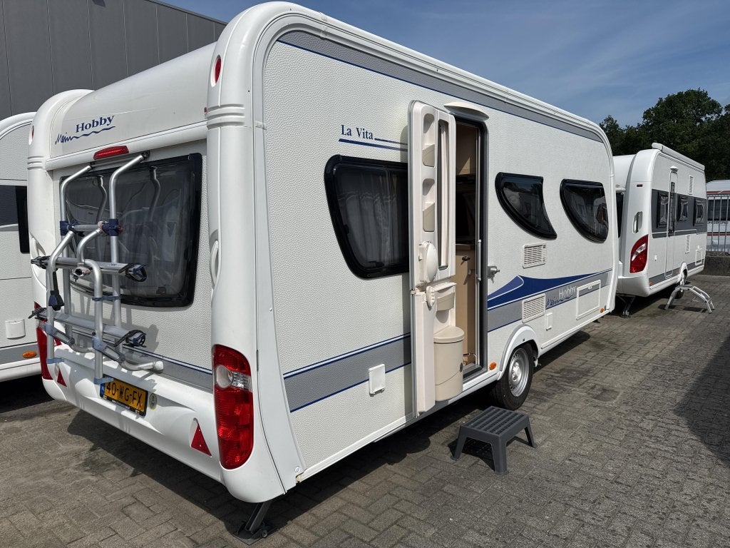 Hobby La Vita Bionda 495 UL, Caravans en Kamperen, Caravans, Rondzit, Bedrijf, 4 tot 5 meter, Overige typen