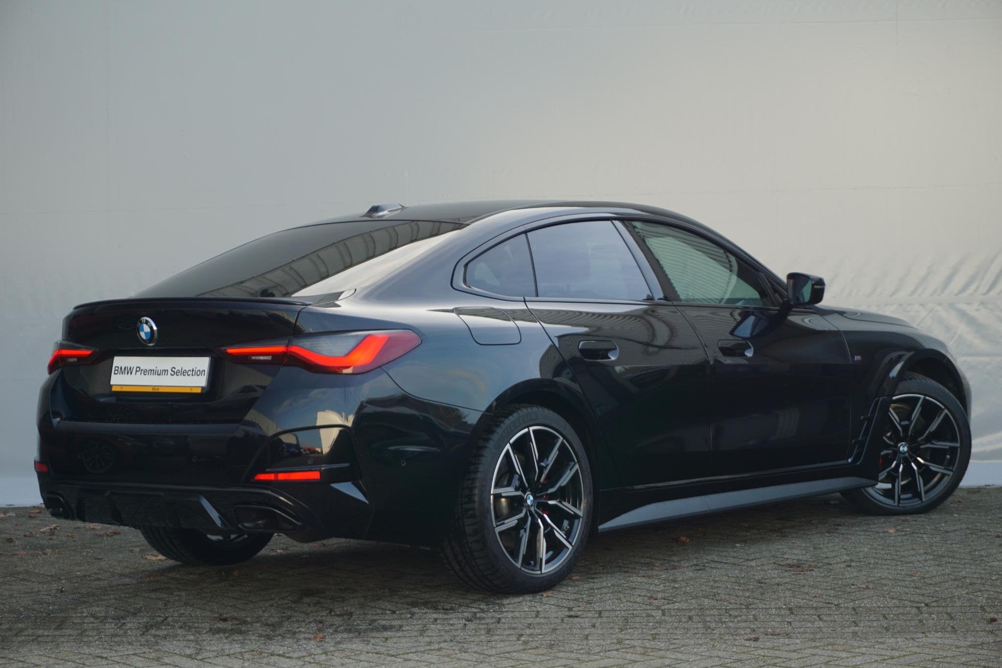 BMW 4 Serie Gran Coupé M440i xDrive M Sportpakket Pro 19'', Auto's, Met garantie (alle), Zwart, 374 pk, Bedrijf