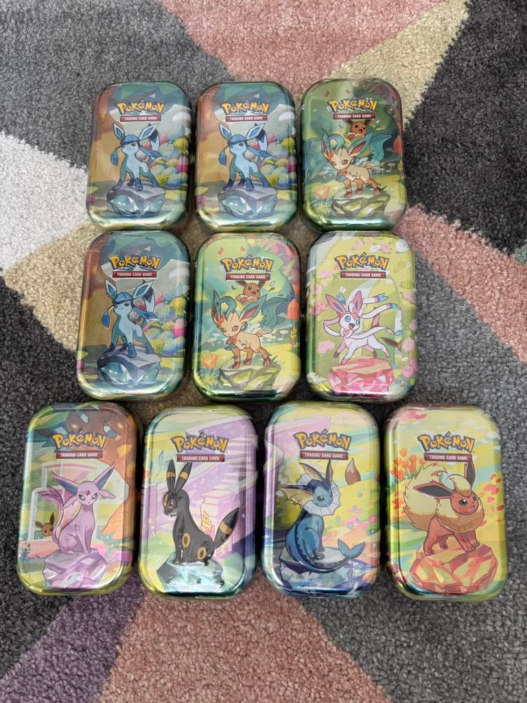 10x Pokémon Prismatic Evolutions Mini Tins - SEALED, Ophalen of Verzenden, Nieuw, Booster, Foil
