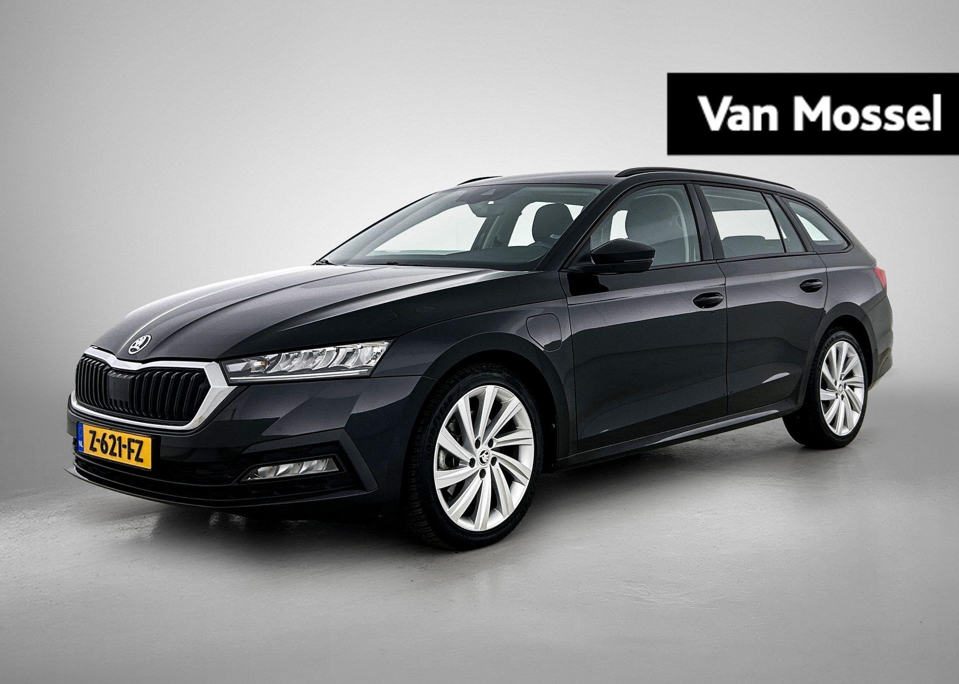 Skoda Octavia Combi 1.4 TSI iV PHEV Business Edition | VIRTU, Auto's, 12 maanden, Stof, Gebruikt, Zwart