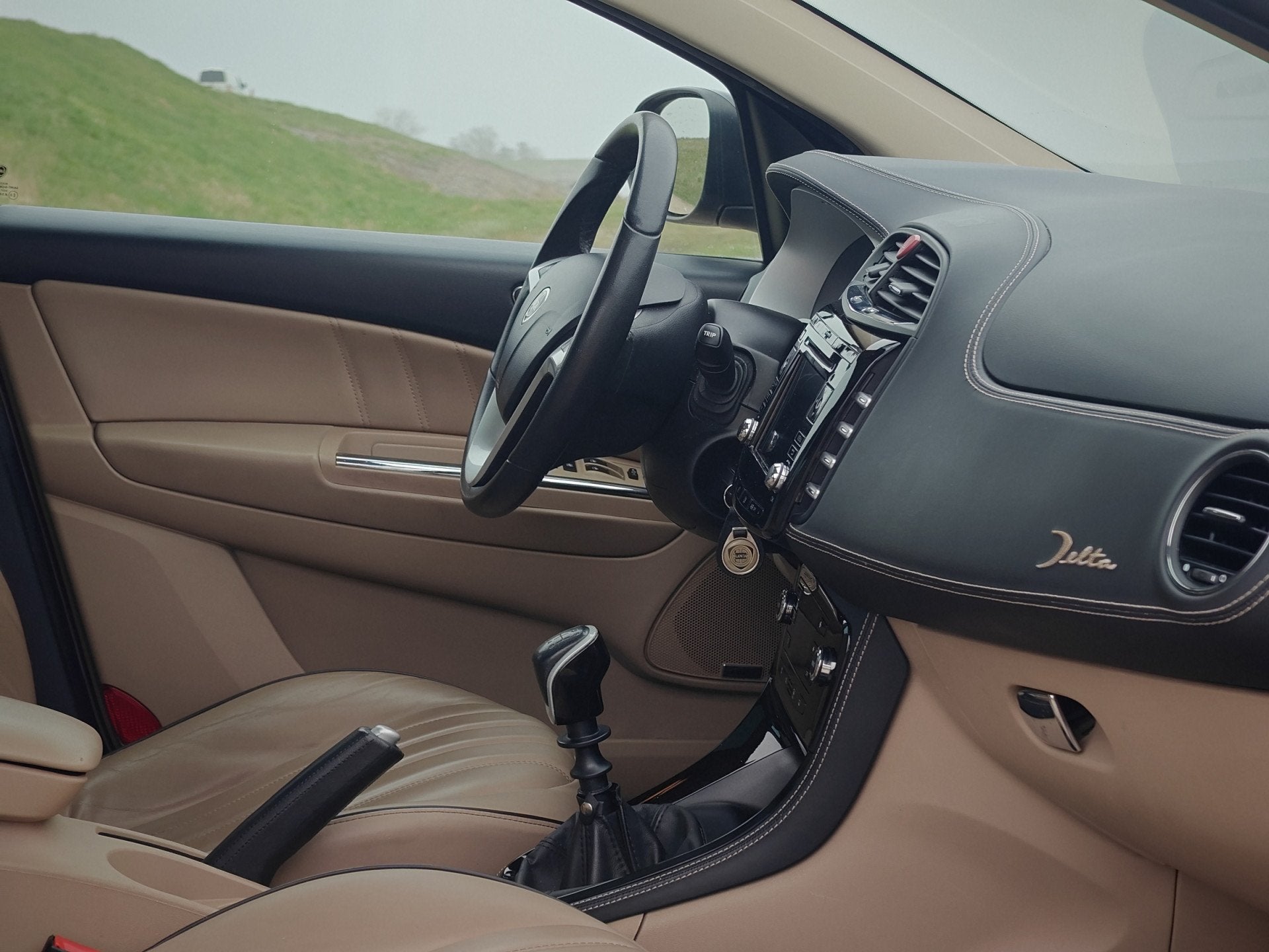 Lancia Delta 1.9-16V Twin-Turbo Executive (bj 2010), Auto's, Lancia, Voorwielaandrijving, Euro 5, Gebruikt, Beige