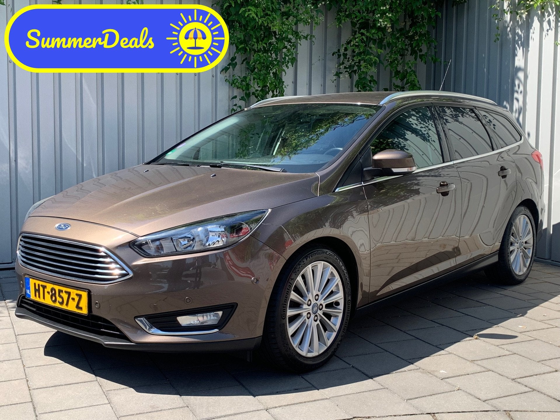 Ford Focus Wagon 1.0 Titanium Edition|Navigatie|Climate Cont, Gebruikt, Bruin, Automatische klimaatregeling, Origineel Nederlands
