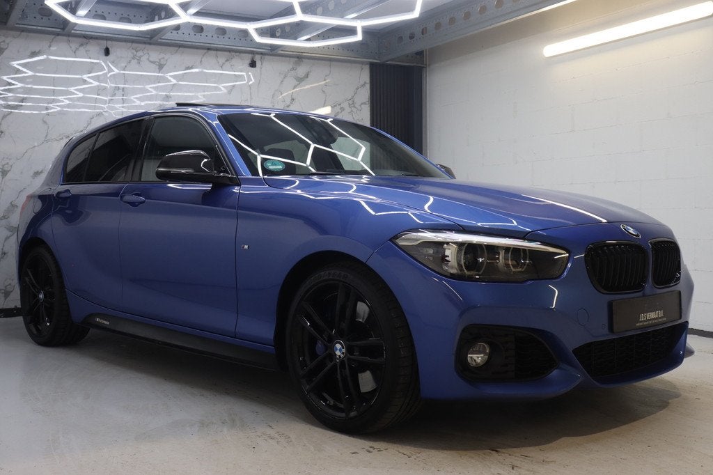 BMW 1-serie 118i Edition M Sport Shadow Executive, Auto's, Gebruikt, Blauw, Bedrijf, 650 kg