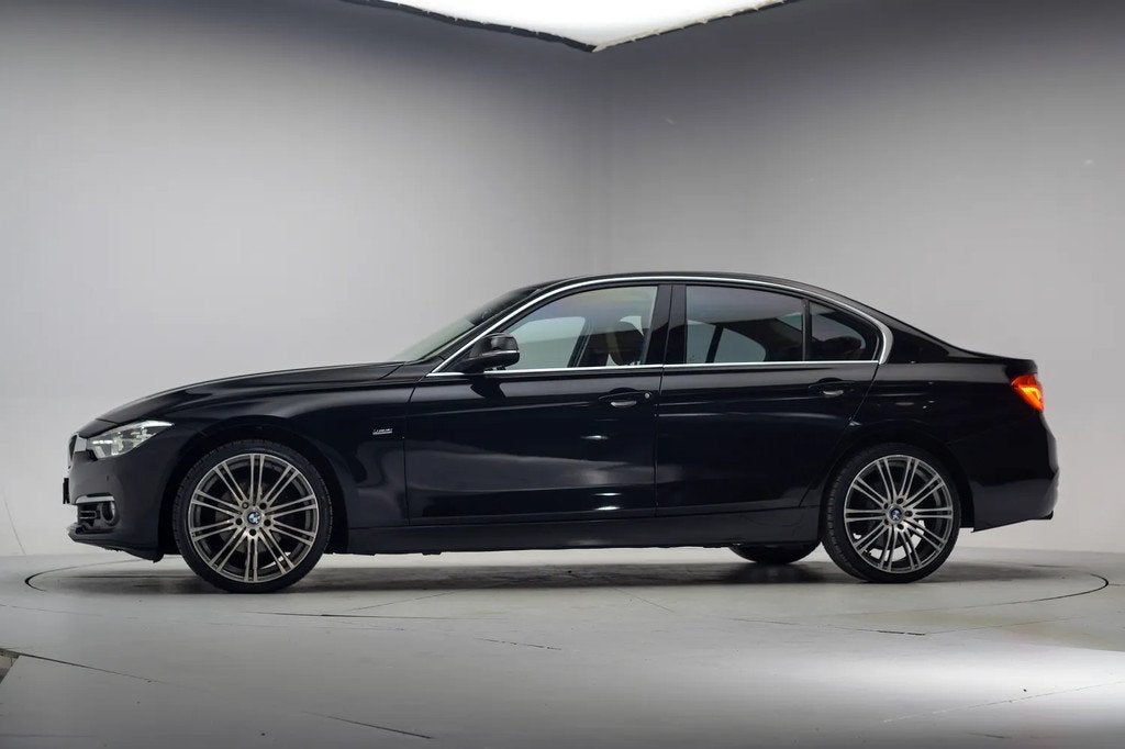 BMW 3 Serie 318i Luxury Line Executive [ Leder Navi prof. LE, Auto's, BMW, Automaat, 136 pk, Gebruikt, Zwart