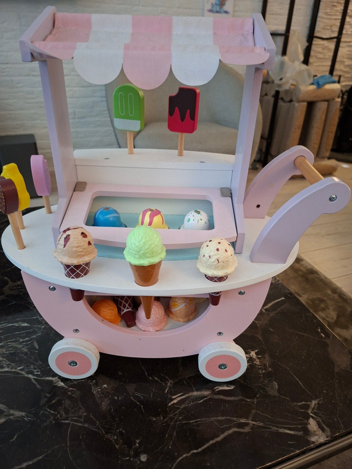 kinder ijsco wagentje, Ophalen