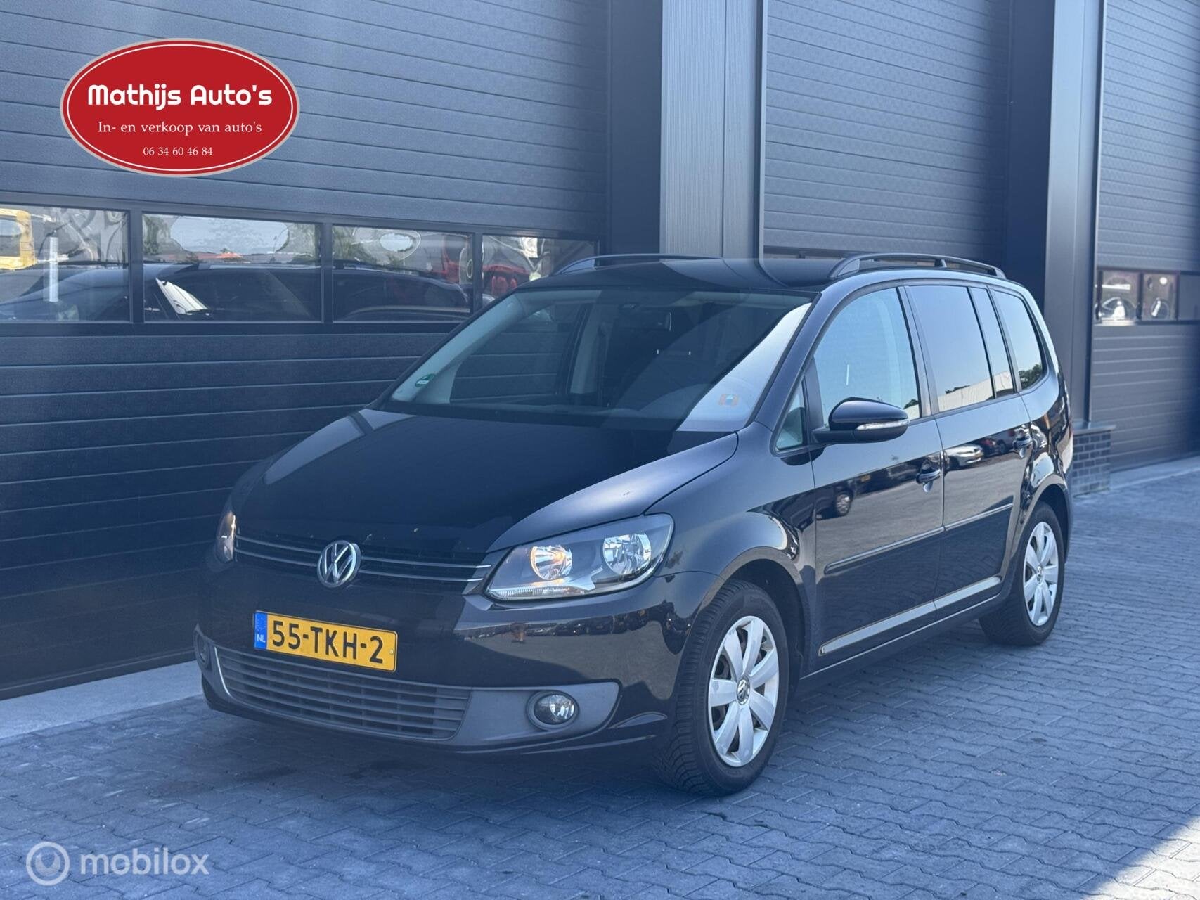 Volkswagen Touran 1.6 TDI Highline BlueMotion, Auto's, Voorwielaandrijving, Euro 5, 4 cilinders, Zwart
