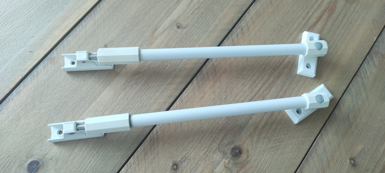 2 telescopische raam/deuruitzetters, Ophalen, Zo goed als nieuw, IJzer, Overige typen