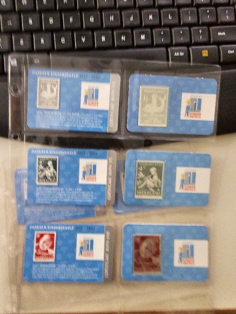 Collectie Kinderpostzegels puur Zilver met kleur in album, Ophalen of Verzenden, Postfris, Overige thema's