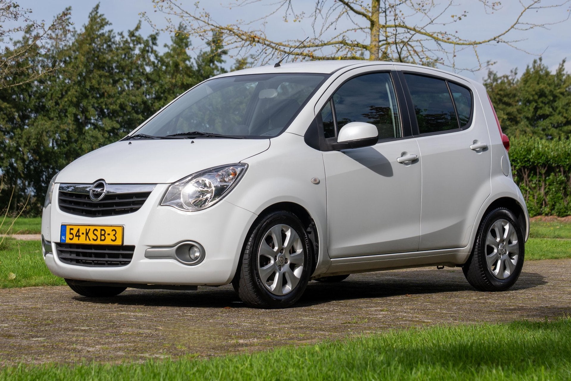 Opel Agila 1.2 Edition Automaat 78.850 km +NAP NL-auto, Auto's, Dealer onderhouden, 4 cilinders, Verwarmde buitenspiegels, Wit
