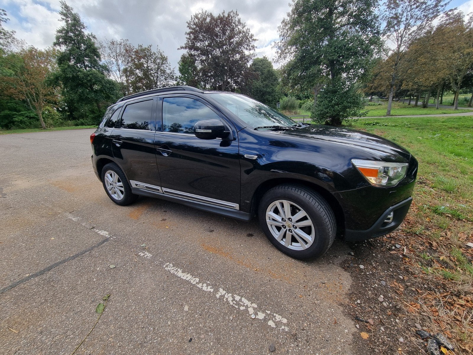 Mitsubishi ASX 1.6 86KW 2011 Zwart Pano dak, Voorwielaandrijving, Stof, Navigatiesysteem, Zwart