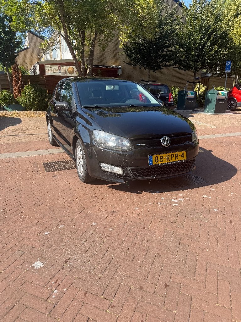 Volkswagen Polo 1.2 TDI 55KW BM 2011 Zwart, Auto's, Volkswagen, Voorwielaandrijving, Euro 5, Stof, 74 pk