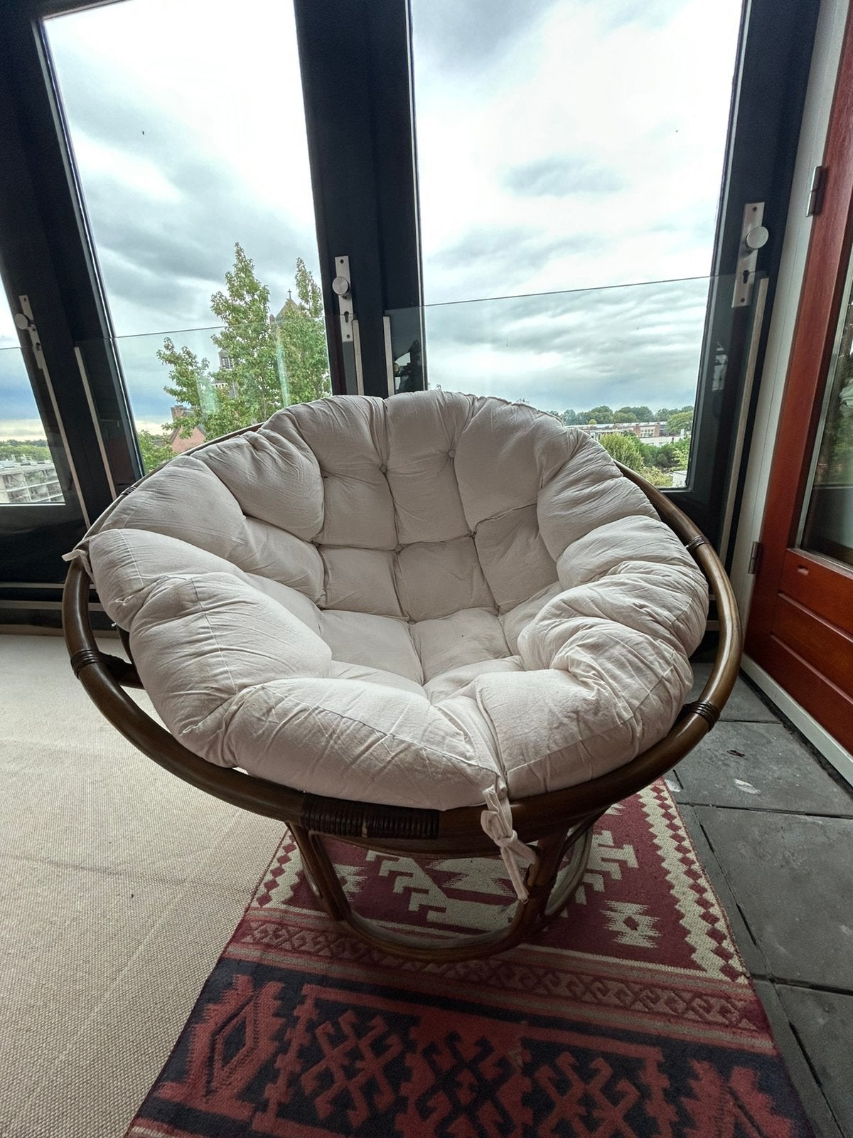 Grote Xenos papasan loungestoel rotan met ecru kussen, Huis en Inrichting, Ophalen, Gebruikt, 75 tot 100 cm, Riet of Rotan