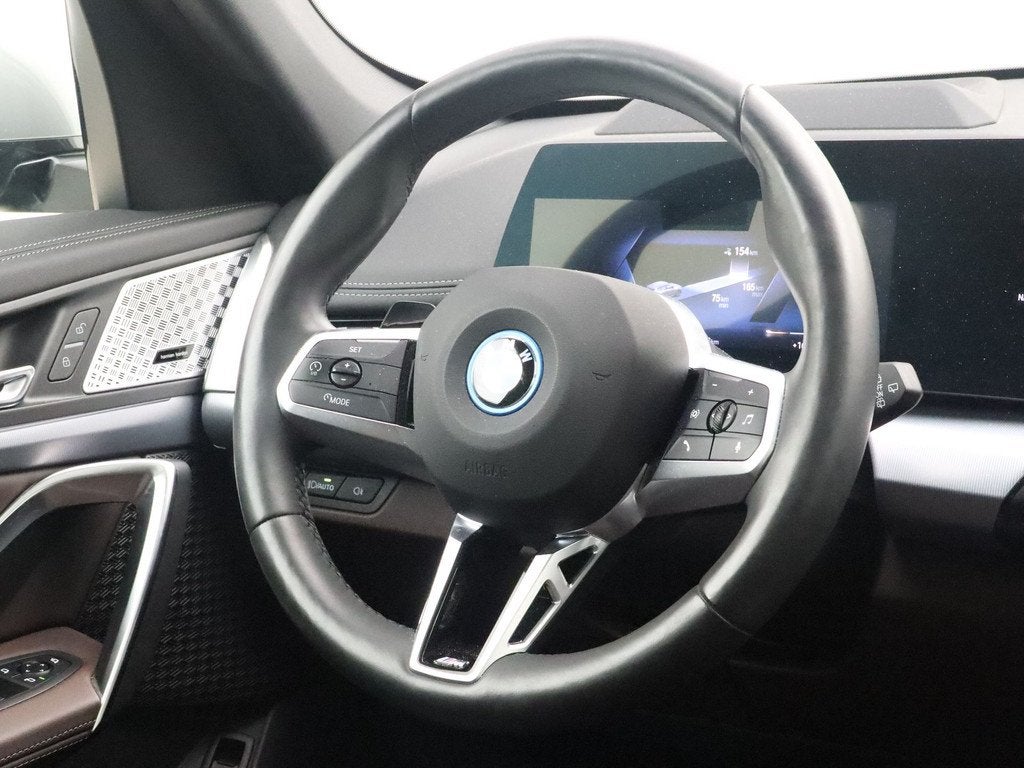 BMW iX1 xDrive30 Launch Edition 67 kWh (bj 2023, automaat), Auto's, BMW, 421 km, Gebruikt, Zwart, Met garantie (alle)