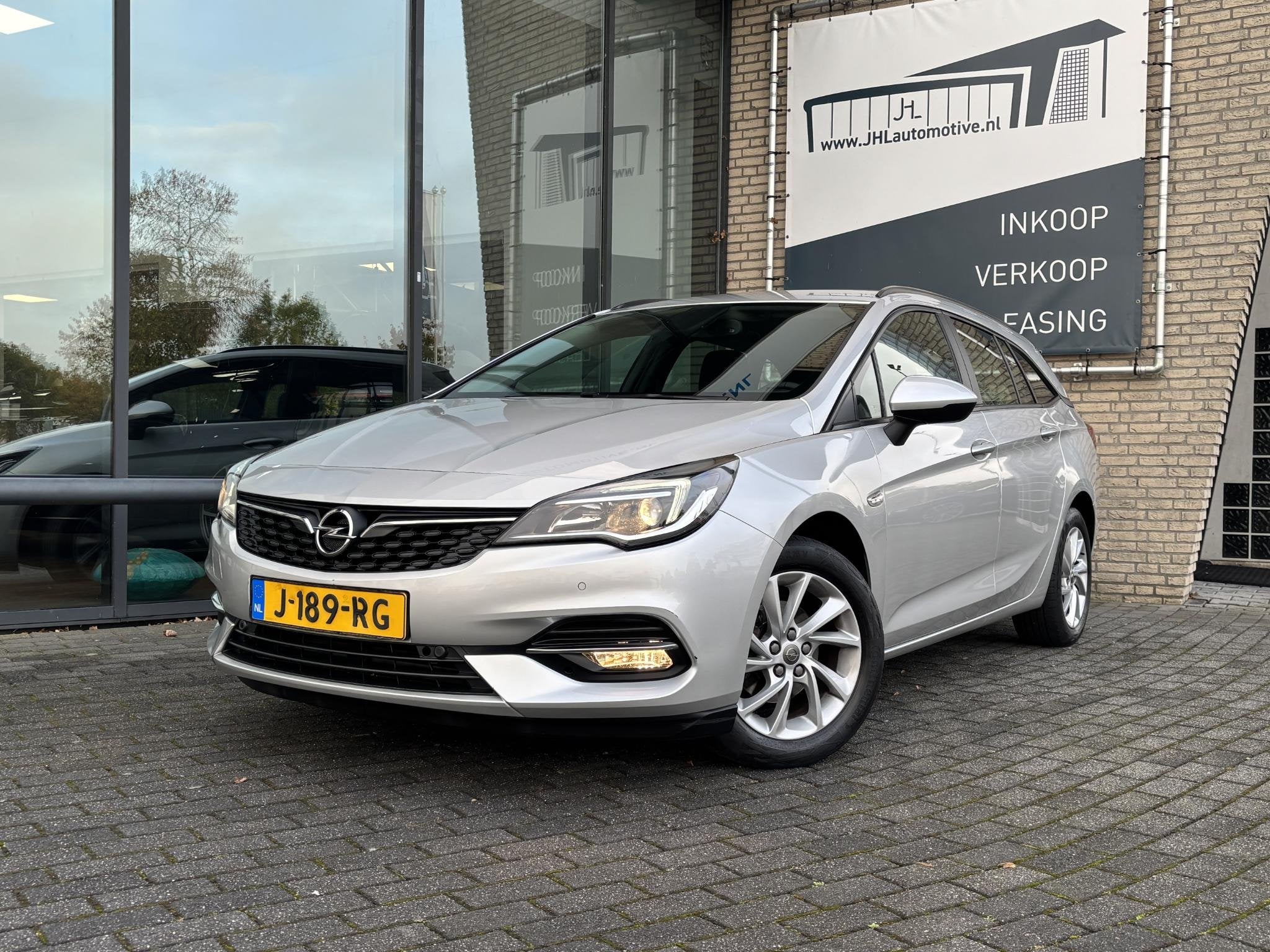 Opel Astra Sports Tourer 1.2 Edition*NAVI*ECC*CRUISE*CAMERA*, Auto's, Voorwielaandrijving, Stof, Gebruikt, 1199 cc