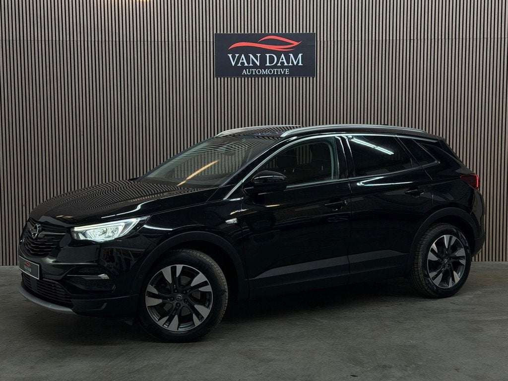 Opel Grandland X 1.2 Turbo Innovation 2020 LED TREKHAAK CAME, Auto's, Opel, Stof, 1199 cc, Zwart, Bedrijf
