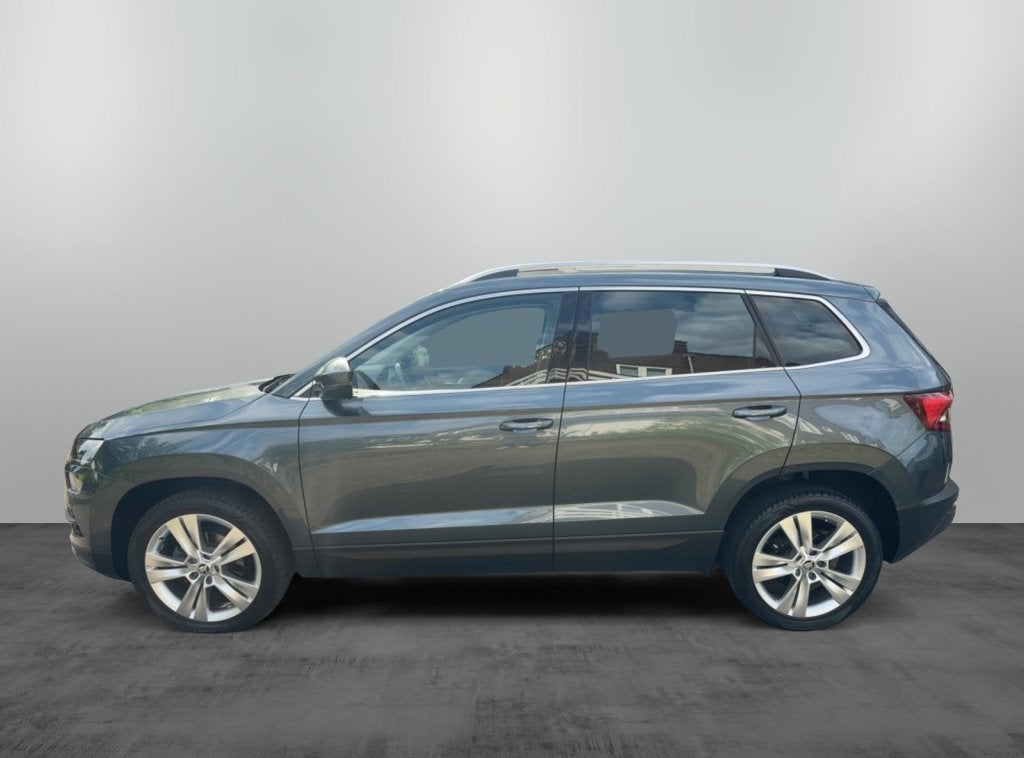 Skoda Karoq 1.0 TSI Style Business Panoramadak (bj 2019), Auto's, Skoda, Automaat, 12 maanden, Gebruikt, 1261 kg