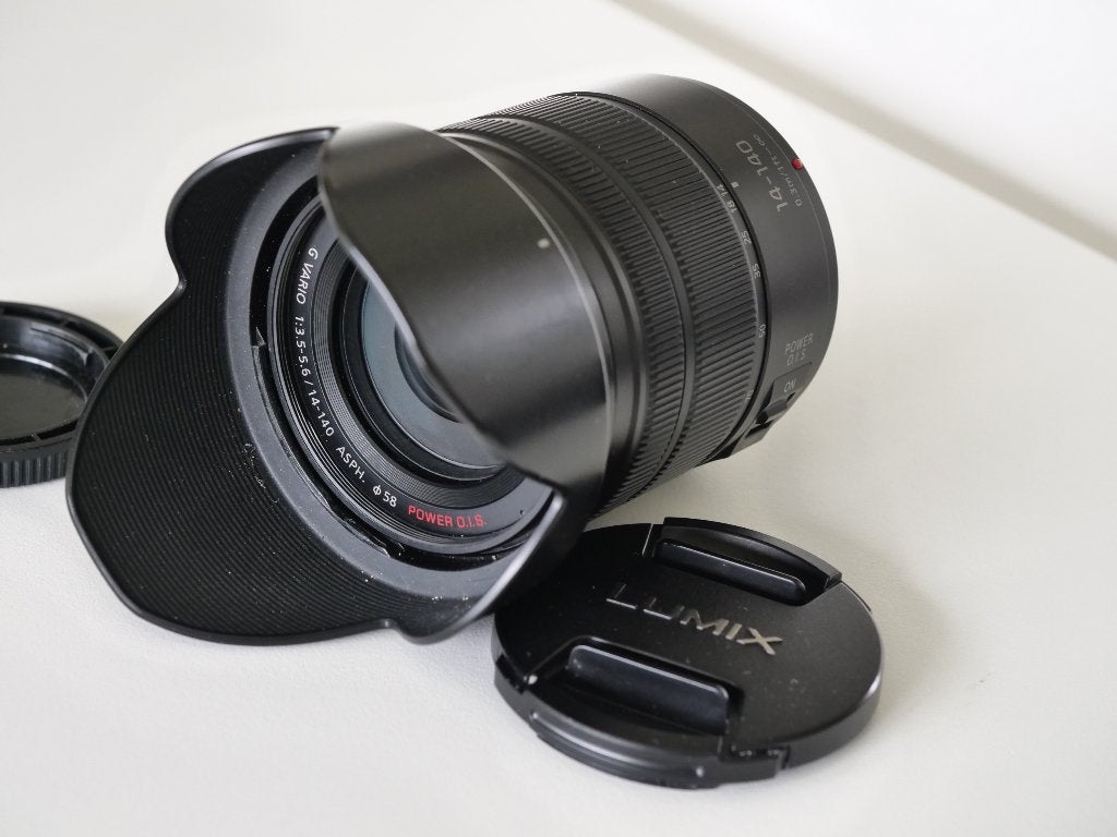 Panasonic 14-140 14-140mm Power OIS MFT 3.5-5.6 nieuwstaat, Zonnekap, Micro Four Thirds, Ophalen of Verzenden, Zo goed als nieuw