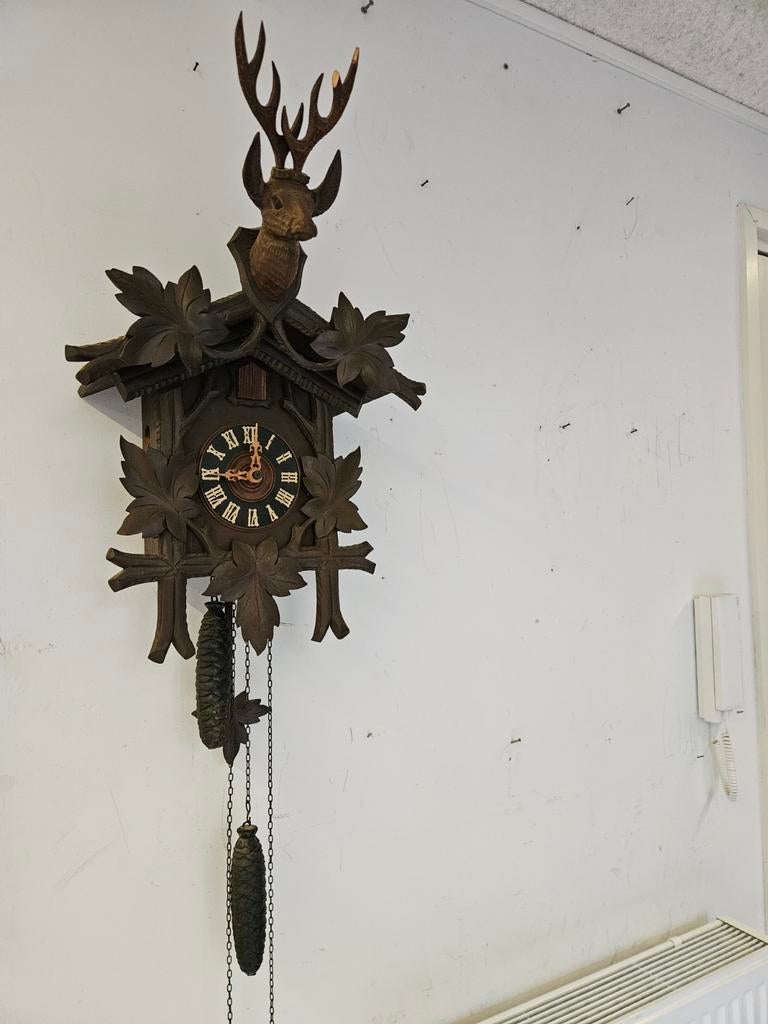 Vintage koekoeksklok met hertenkop, Ophalen